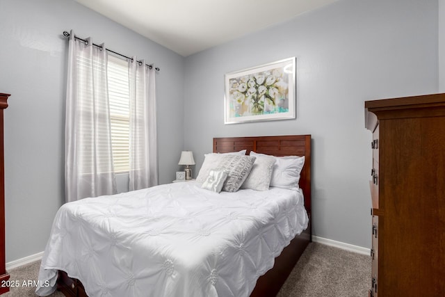 carpeted bedroom with baseboards