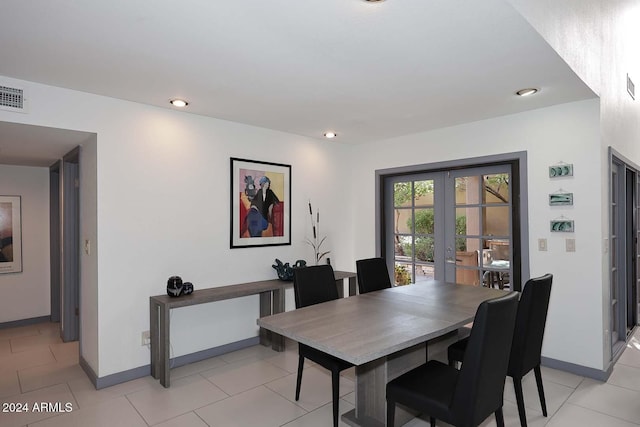 tiled dining space with french doors