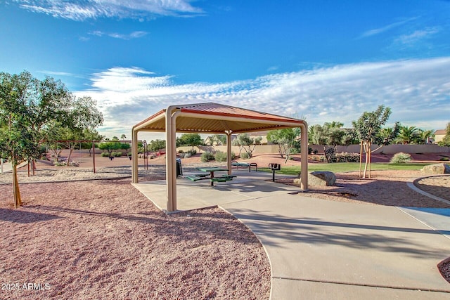 view of property's community with a gazebo and playground community