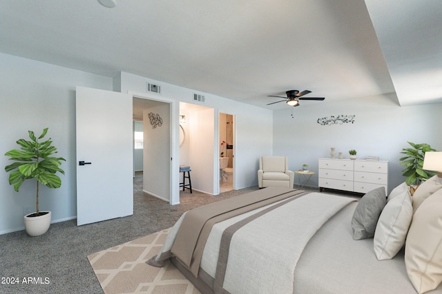 bedroom featuring carpet, ceiling fan, and connected bathroom