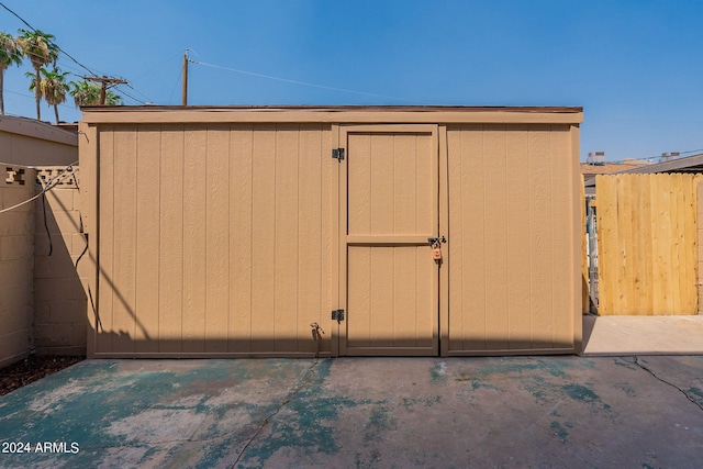 exterior space featuring a storage unit