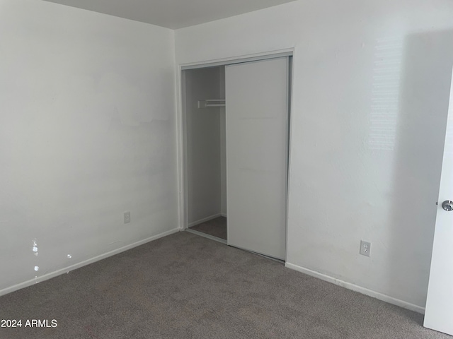 unfurnished bedroom featuring carpet floors