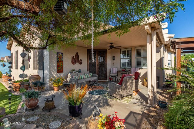 19104 N Smith Dr, Maricopa, AZ 85139 - view of patio / terrace featuring ceiling fan and an outdoor living space