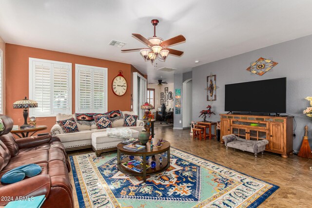 19104 N Smith Dr, Maricopa, AZ 85139 - living room featuring visible vents, baseboards, and a ceiling fan