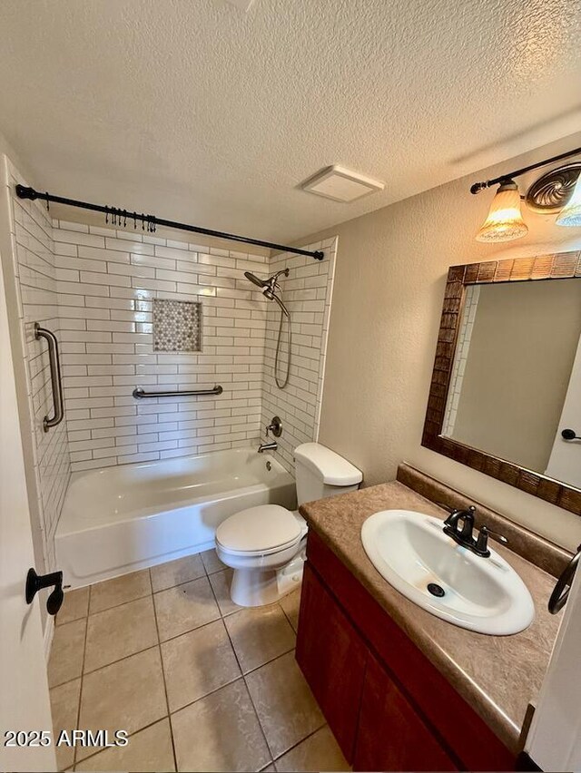 full bathroom with a textured ceiling, shower / tub combination, toilet, and tile patterned floors