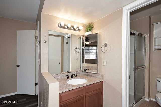 full bathroom with tile patterned floors, vanity, toilet, and tiled shower / bath