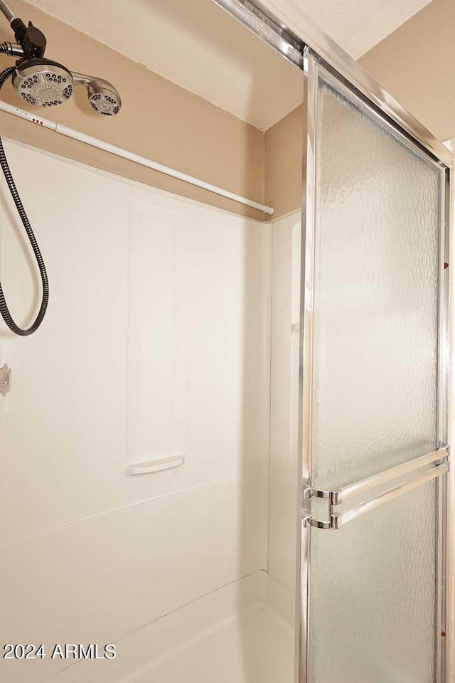 bathroom with an enclosed shower