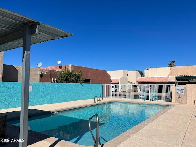 view of pool with a patio