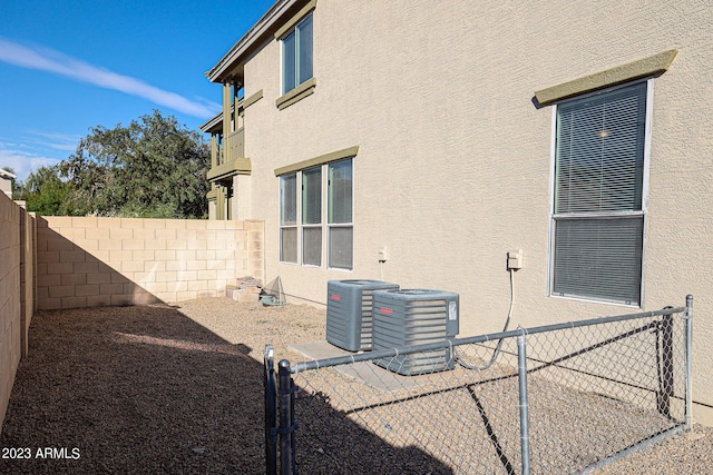 view of side of home with cooling unit