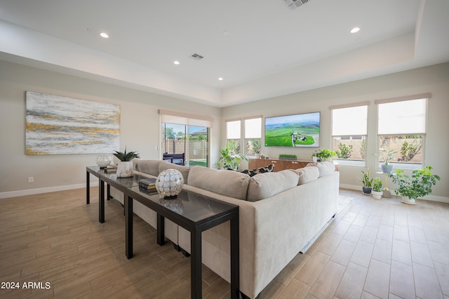 living room with light hardwood / wood-style floors