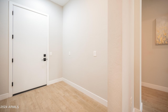 doorway to outside with light hardwood / wood-style flooring