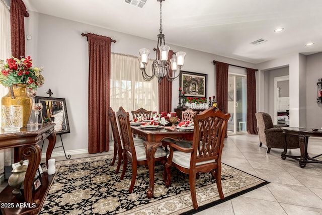 dining space featuring light tile patterned flooring, recessed lighting, a notable chandelier, visible vents, and baseboards