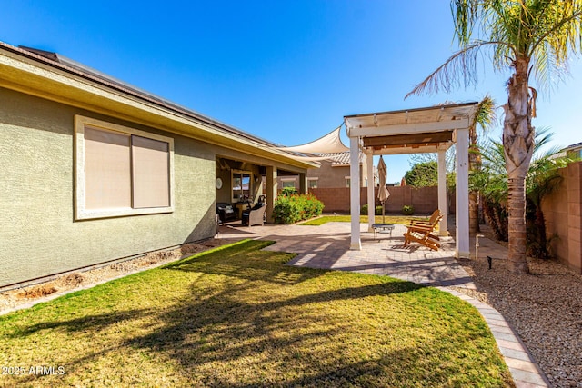 view of yard featuring a patio area and a fenced backyard