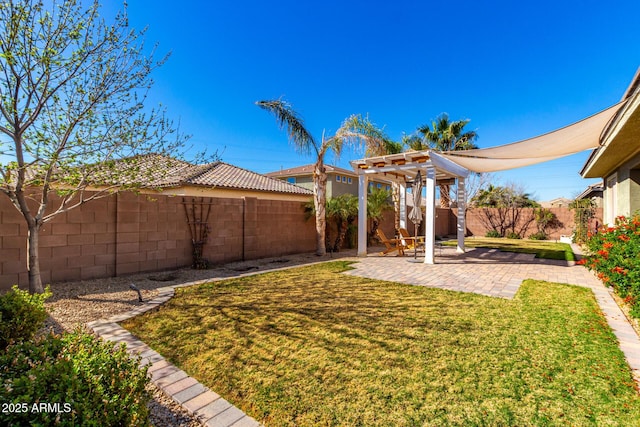 view of yard with a patio, a fenced backyard, and a pergola