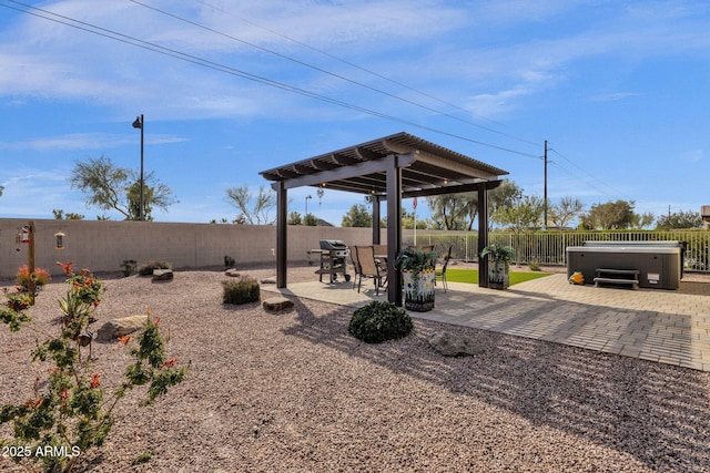 view of yard with a hot tub and a patio