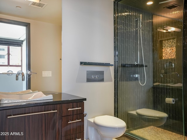 114 W Adams St Ph, Ph, Phoenix, AZ 85003 - bathroom with vanity, toilet, and a stall shower