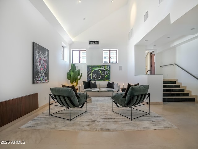 114 W Adams St Ph, Ph, Phoenix, AZ 85003 - living area featuring high vaulted ceiling and stairway