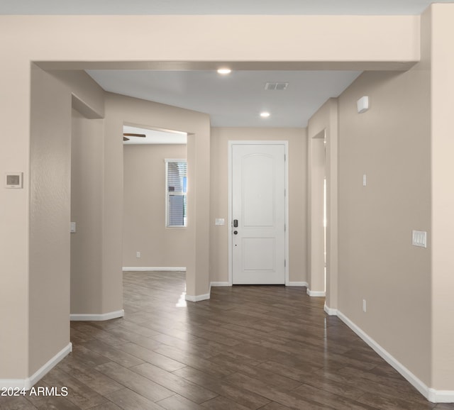 entryway featuring ceiling fan and dark hardwood / wood-style flooring