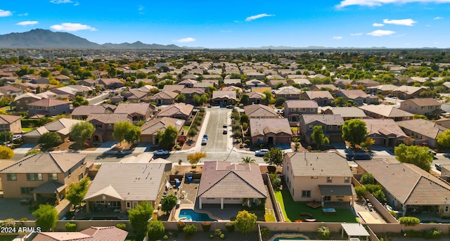 bird's eye view with a mountain view