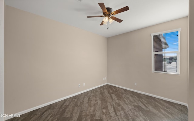 unfurnished room with ceiling fan and wood-type flooring