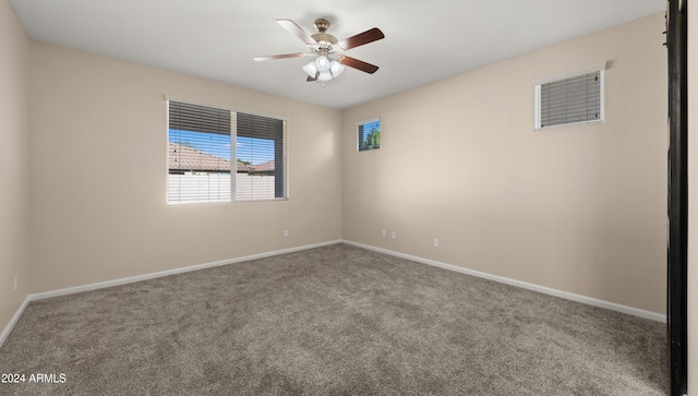 carpeted empty room with ceiling fan