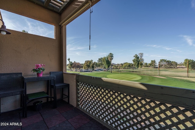 balcony featuring golf course view