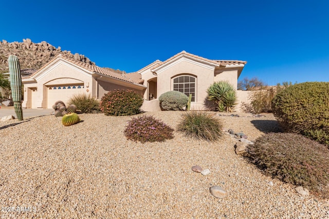 view of front of house with a garage