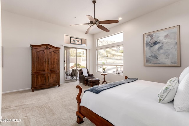 bedroom featuring ceiling fan and light colored carpet