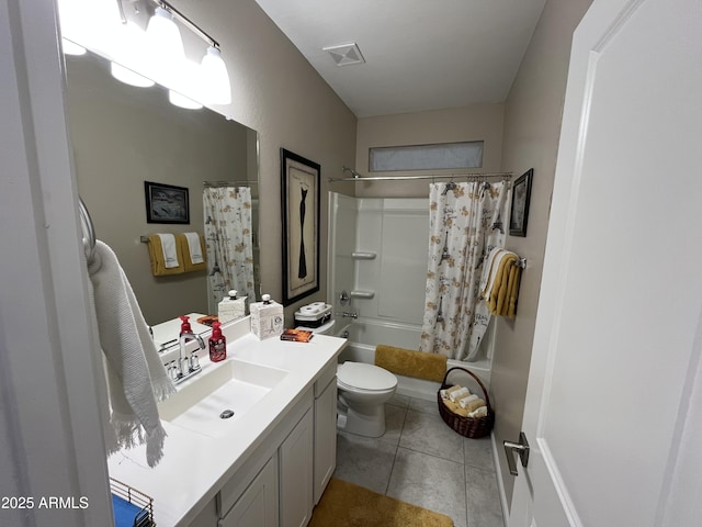 full bathroom with tile patterned flooring, vanity, shower / bath combination with curtain, and toilet