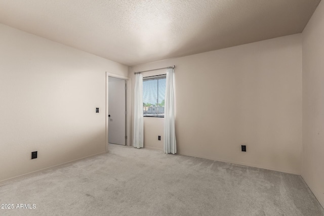 6902 W Devonshire Ave Unit 1280, Phoenix, AZ 85033 - empty room with carpet flooring and a textured ceiling