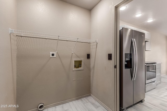 6902 W Devonshire Ave Unit 1280, Phoenix, AZ 85033 - washroom with baseboards, laundry area, electric dryer hookup, and hookup for a washing machine