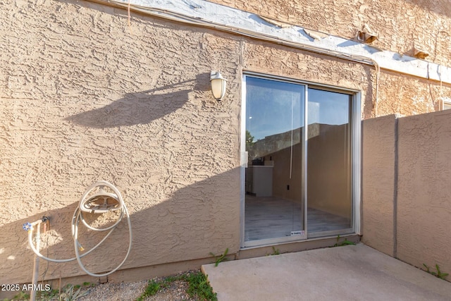 6902 W Devonshire Ave Unit 1280, Phoenix, AZ 85033 - view of side of home with a patio and stucco siding