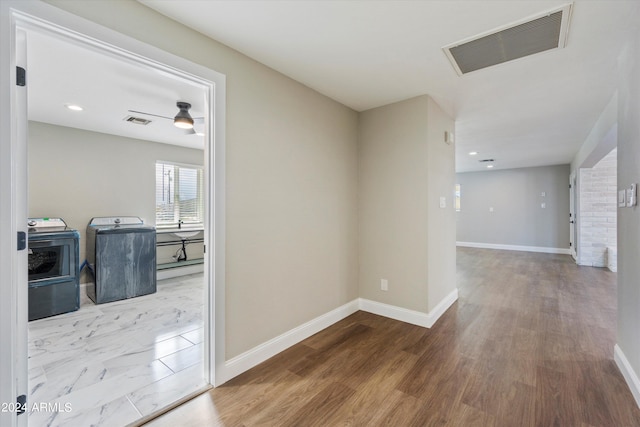 hallway featuring hardwood / wood-style floors