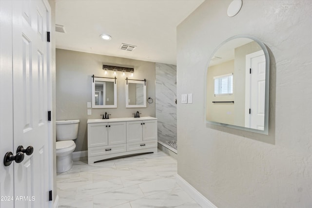 bathroom with vanity, toilet, and walk in shower