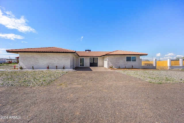 view of front of house with a patio area