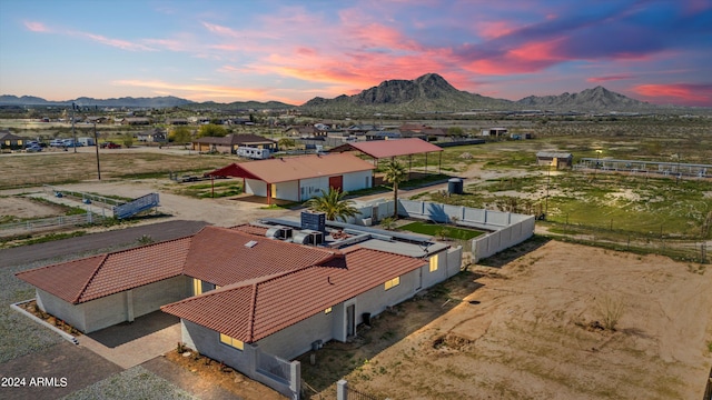 aerial view at dusk with a mountain view