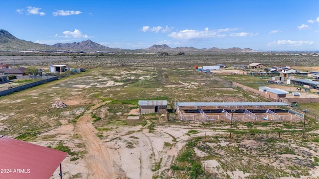 drone / aerial view featuring a mountain view