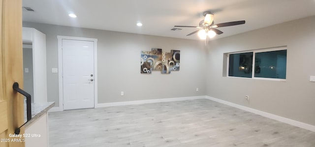329 W Fairhaven Rd, Kearny, AZ 85137 - spare room featuring light wood-style floors, ceiling fan, baseboards, and recessed lighting
