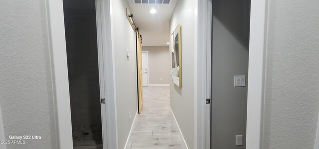 329 W Fairhaven Rd, Kearny, AZ 85137 - corridor featuring a textured wall, baseboards, light wood-style floors, and recessed lighting