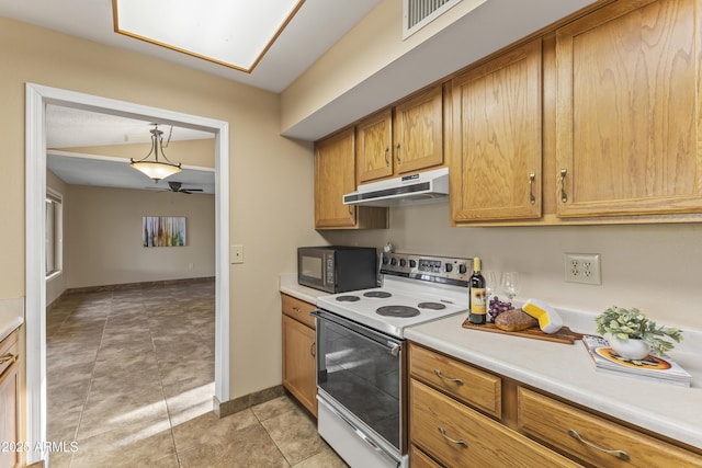 kitchen with white range with electric stovetop, ceiling fan, and light tile patterned floors