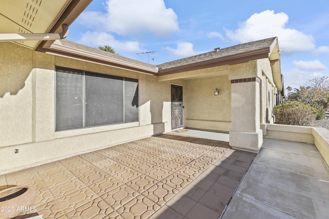 rear view of house featuring a patio area