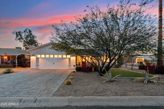 view of front of home with a garage