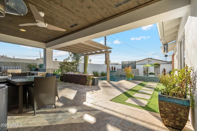 view of patio / terrace featuring a shed, grilling area, and ceiling fan