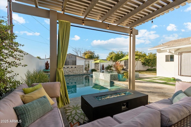 view of patio featuring an outbuilding, a pergola, and an outdoor living space with a fire pit