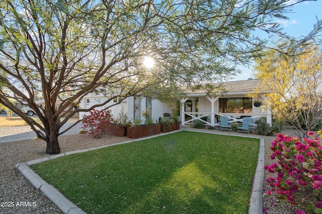 exterior space featuring a front lawn