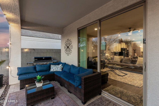 view of patio with a grill and outdoor lounge area