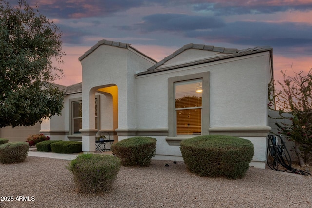 view of front of property featuring stucco siding