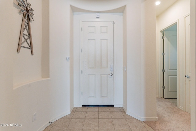 corridor with light carpet