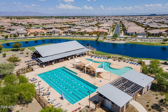 birds eye view of property featuring a water view