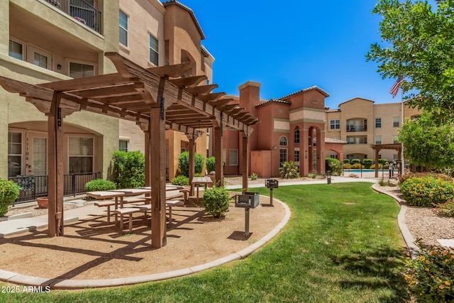 14575 W Mountain View Blvd Unit 12309, Surprise, AZ 85374 - view of community featuring a pergola, a pool, a yard, and a patio area